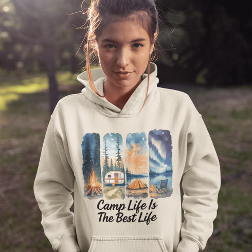 Our Camp Life Is The Best Life Hoodie features four epic camping scenes—from starry skies and crackling fires to cozy tents and scenic trails.
